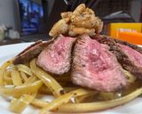 A picture of step 7 of Surf n’ Turf over Garlic Basil Fettuccine.