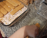 Foto del paso 5 de la receta: Postre de Vainillas con chocolate, crema y frutas