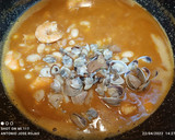 Foto del paso 10 de la receta: Judías blancas con langostinos y chirlas enfadadas