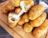 صورة لخطوة 4 من وصفة أصابع البطاطس بالموتزاريلا 🥔