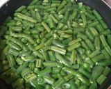 A picture of step 1 of Beans Poriyal.