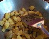 A picture of step 2 of Raw Mango curry.
