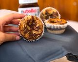 A picture of step 11 of NUTELLA SWIRL MUFFINS eggless.