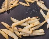 A picture of step 7 of Boiled egg sandwich with French fries.