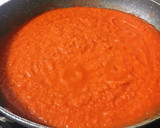 Foto del paso 4 de la receta: Albóndigas de pollo y berenjena al horno con salsa de tomate