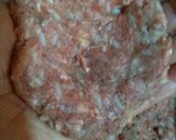 A picture of step 2 of Meatballs Stuffed with Hard-Boiled Egg.