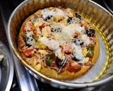A picture of step 12 of Jain Cheese burst pizza.