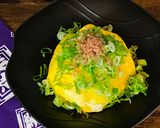 A picture of step 7 of Omu-Okonomiyaki (Japanese as-you-like pancake wrapped with egg).