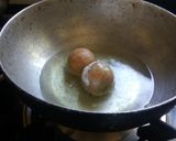 A picture of step 4 of Poha cheese bombs.