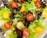 A picture of step 1 of Greek salad with shrimps.