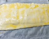 Foto del paso 7 de la receta Hojaldre de york y queso con cobertura de pipas de girasol