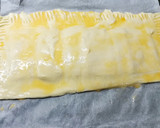 Foto del paso 7 de la receta: Hojaldre de york y queso con cobertura de pipas de girasol