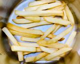 A picture of step 6 of Peri peri fries.