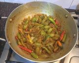 A picture of step 5 of Chilli and grapes Pickle.