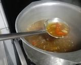A picture of step 6 of 19 b soup with garlic bread.