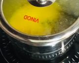 A picture of step 3 of Narkel diye Bhaja Muger Dal: Bengali Style- Yellow Moong Dal with Coconut (Without Onion-Garlic).