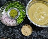 A picture of step 2 of Leftover Poha and Sonth powder Fritters.
