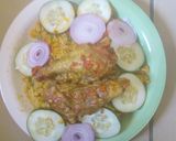 A picture of step 10 of Jollof rice and chicken stew.