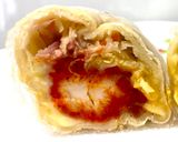 A picture of step 7 of Spicy Chicken Tortilla Wraps.