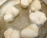 A picture of step 2 of Deep fried pizza dough balls.
