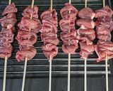 A picture of step 4 of Chicken heart kebabs with peanut satay dip.