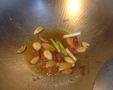 A picture of step 1 of Three Cup Chicken Thighs with King Oyster Mushrooms.