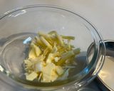 A picture of step 3 of Easy Microwave Cheese Sauce.