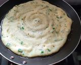 A picture of step 3 of Green Onion chilla.