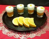 A picture of step 6 of Orange Jelly Pudding Layer in a Glass.