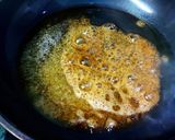 A picture of step 2 of Shahi Sooji Halwa.