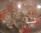 Foto del passaggio 4 della ricetta Spaghetti con telline e pomodorini