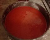 A picture of step 4 of Red velvet cake with white chocolate cream cheese frosting.