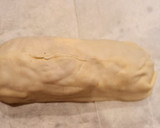 Foto del paso 4 de la receta: Solomillo en hojaldre con panceta, queso y piquillos
