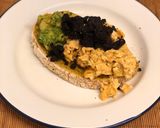 A picture of step 6 of Paprika eggs. Turmeric Sourdough. Black pudding crumb. Smashed avocado.