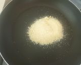 A picture of step 2 of Baked caramel popcorns.