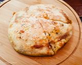 A picture of step 8 of Aloo Cheese Naan.