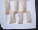 A picture of step 7 of Chicken cheese spring rolls.
