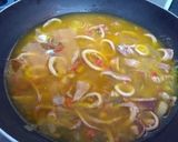 Foto del paso 7 de la receta: Arroz con azafrán y calamares
