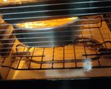 A picture of step 3 of Christmas Tutty fruity vanilla cake.