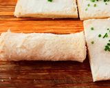 A picture of step 3 of Bacon-wrapped toasted bread rolls.