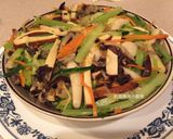 A picture of step 10 of Stir-Fried Mixed Vegetables with Egg Crepe and Curry Sauce.
