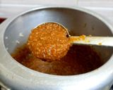 A picture of step 2 of Broken wheat sweet Pongal.
