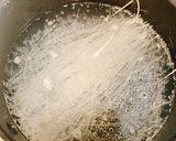 A picture of step 2 of Harusame, onion and lettuce salad with mayonnaise dressing.