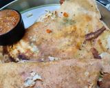 A picture of step 5 of Owar cheese pizza dosa with tomato onion chutney gravy.