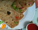 A picture of step 7 of Chicken Wraps😍🐔.