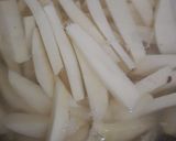 A picture of step 2 of Peri Peri French fries 🍟.