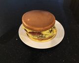 A picture of step 12 of Vanilla Layer Cake filled withLenon and Rasberry and frosted with Fresh Lemon Cream.
