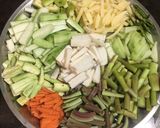 A picture of step 1 of Lentil Fritters in mix veg curry.