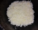 Foto del paso 5 de la receta: Arroz blanco salteado en mantequilla al ajillo