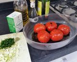 A picture of step 1 of Spaghetti with herby, garlic roasted tomatoes and feta cheese .